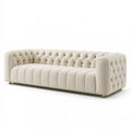 Canapé 3 places 220 cm en tissu beige - style Chesterfield capitonné