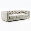 Canapé 3 places 230 x 92 x 78 cm en tissu beige capitonné style classique